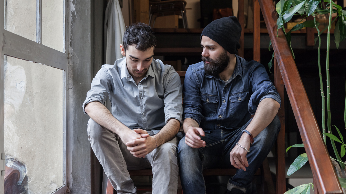 A man speaks to another person. (Source: Getty Images | lorenzoantonucci) A man speaks to another person.